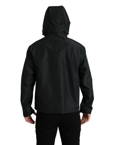 Black polyester hooded jacket with Dolce & Gabbana logo plaque, featuring a stylish, casual design and front zipper closure.