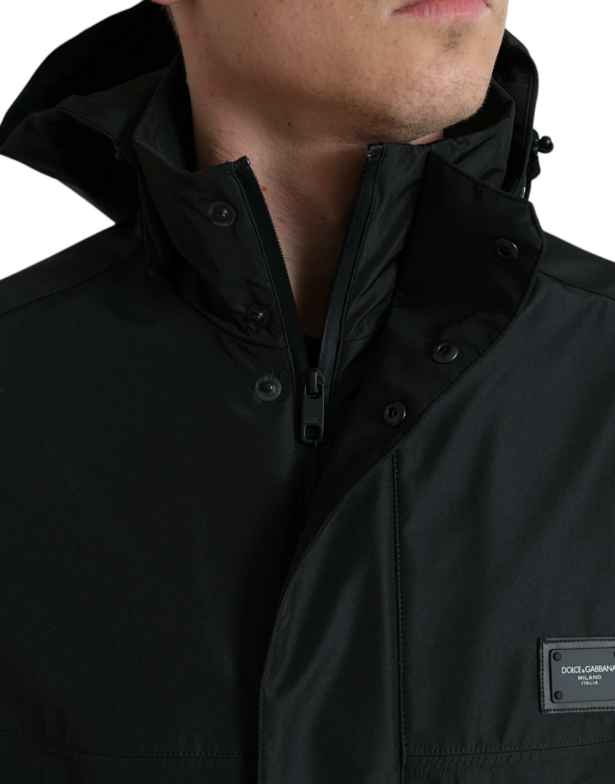 Black polyester hooded jacket with Dolce & Gabbana logo plaque, featuring a casual fit and modern design.