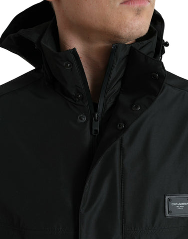 Black polyester hooded jacket with Dolce & Gabbana logo plaque, featuring a casual fit and modern design.