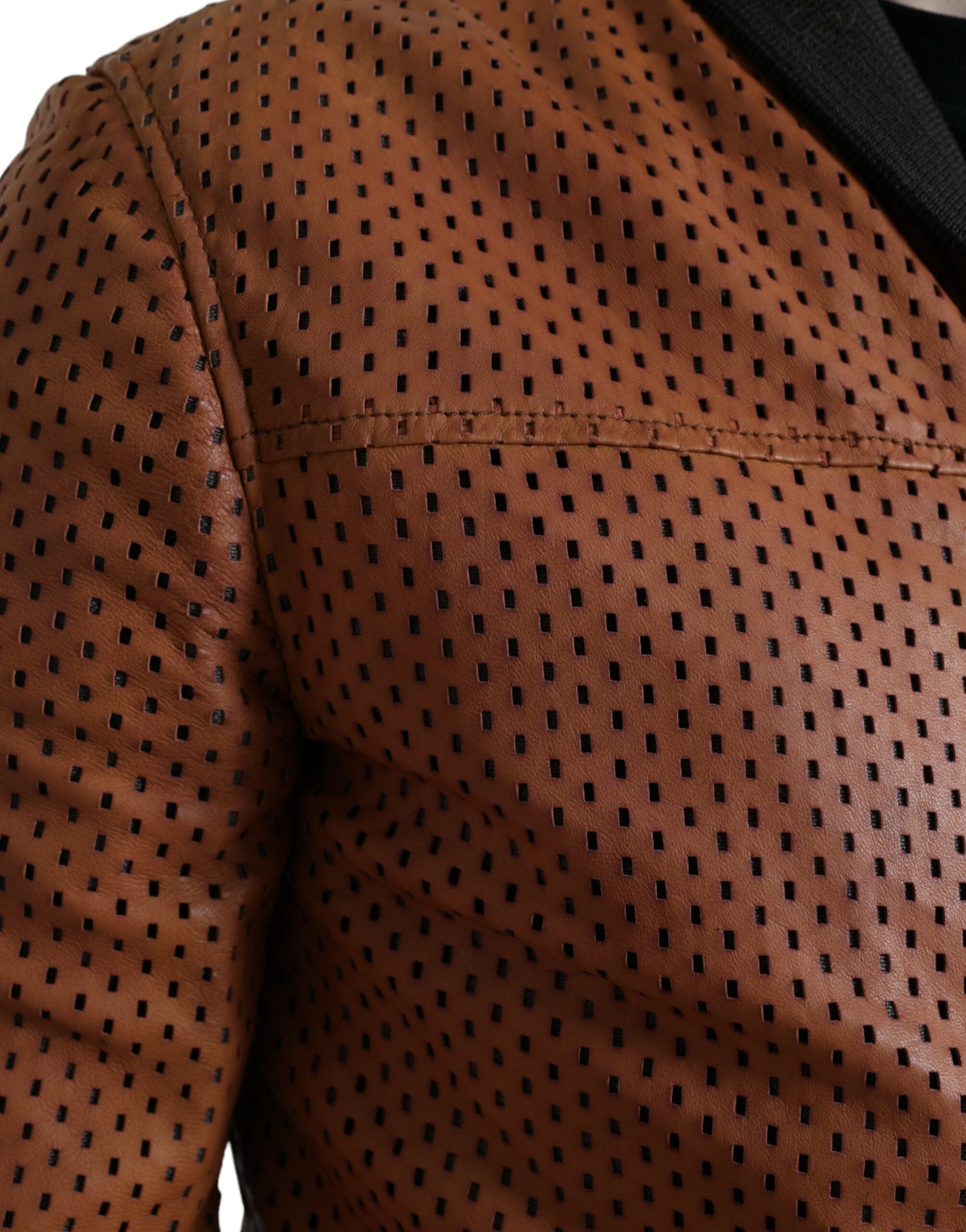 Brown lambskin leather perforated jacket by Dolce & Gabbana, featuring a sleek design and stylish perforated details.