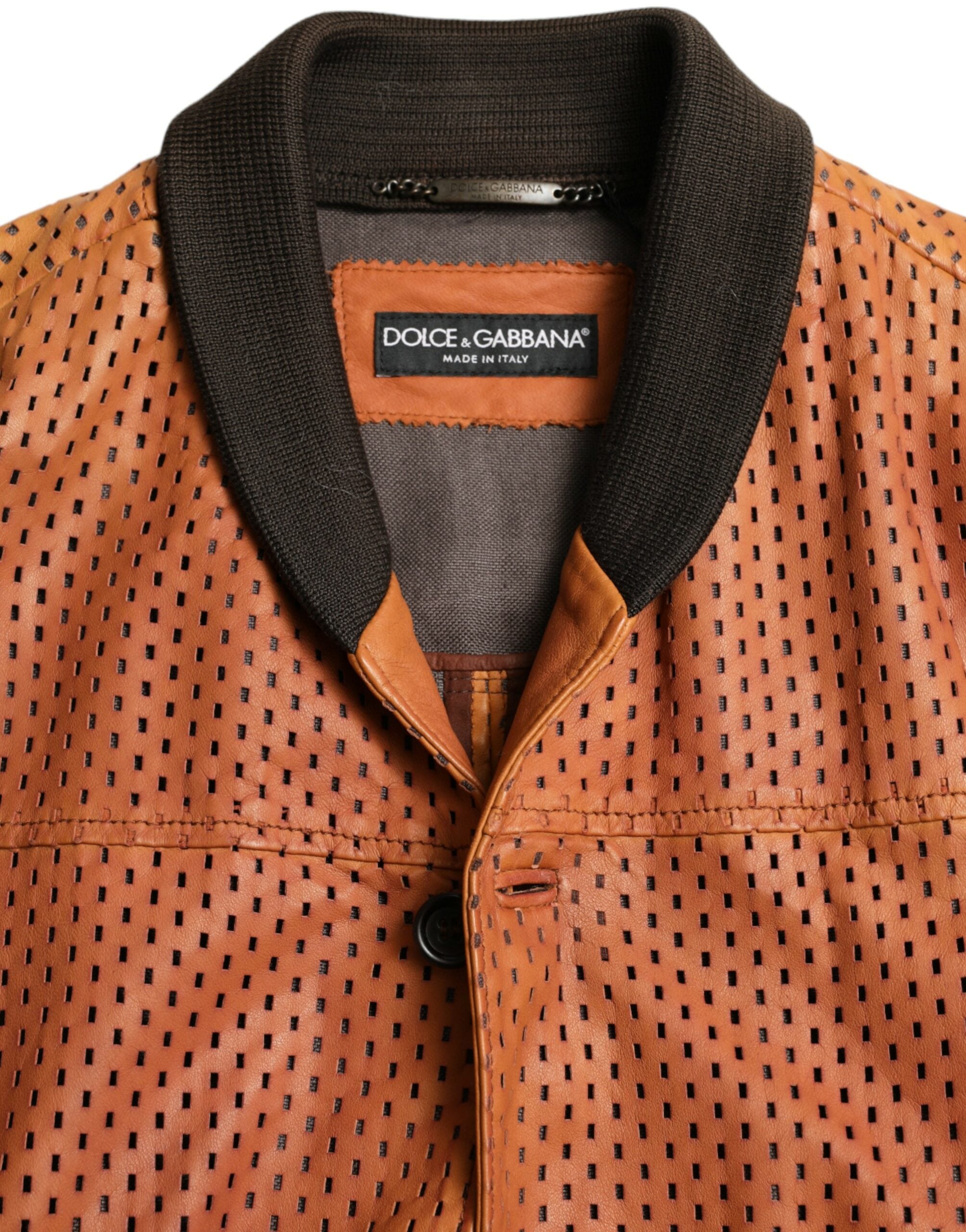 Brown perforated lambskin leather jacket by Dolce & Gabbana displayed on a hanger.