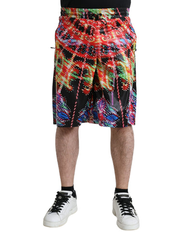 Multicolor Luminarie print men’s Bermuda shorts by Dolce & Gabbana with vibrant, artistic patterns and relaxed fit.