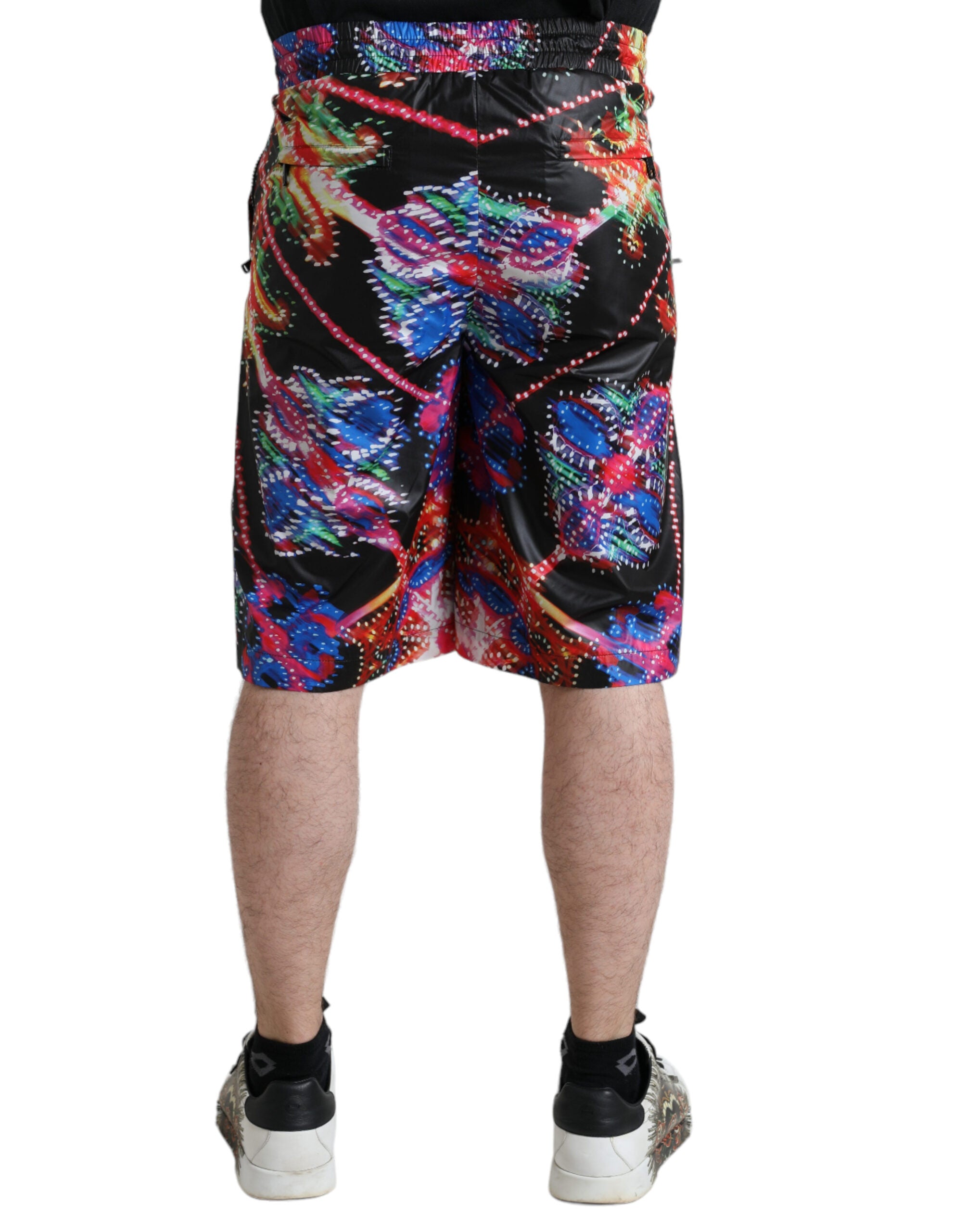 Multicolor Luminarie print men's Bermuda shorts by Dolce & Gabbana, featuring vibrant geometric patterns and relaxed fit.