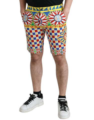 Multicolor Carretto print men's Bermuda shorts by Dolce & Gabbana with vibrant pattern and casual fit.