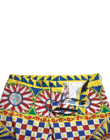 Multicolor Carretto print men's Bermuda shorts by Dolce & Gabbana with vibrant patterns and a casual fit.