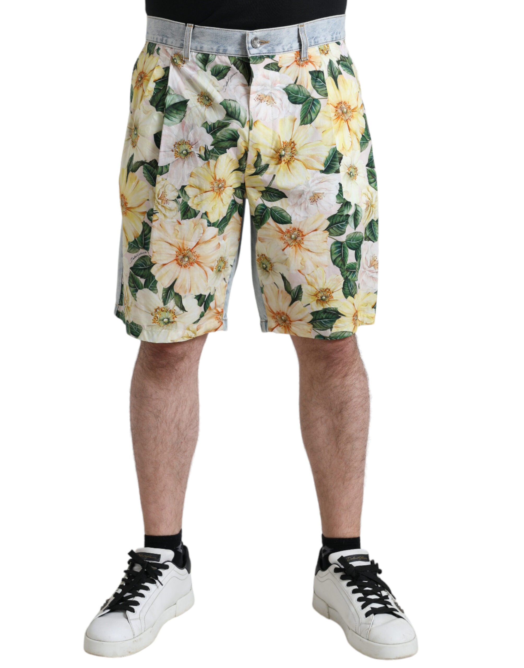 Multicolor floral print denim Bermuda shorts from Dolce & Gabbana, featuring vibrant floral patterns and classic denim fabric.