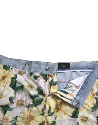 Multicolor floral print denim Bermuda shorts by Dolce & Gabbana, showing vibrant pattern and classic denim texture.