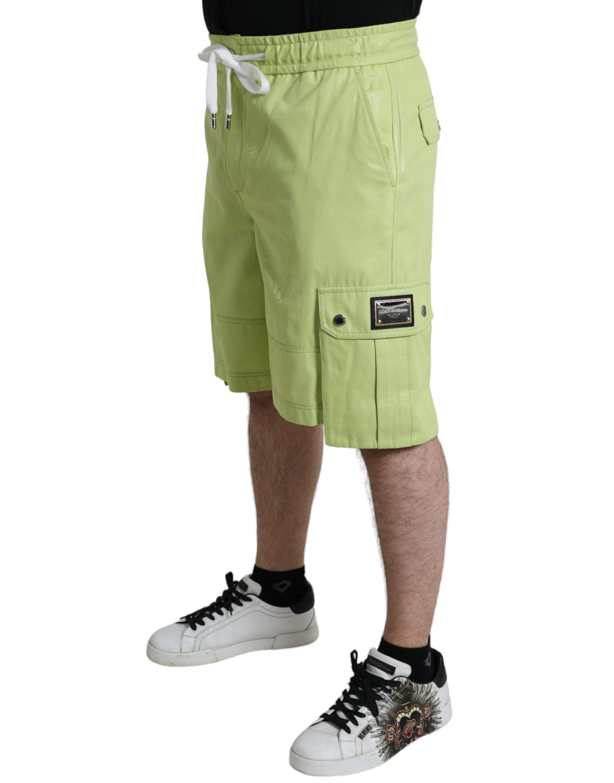 Light green cotton cargo Bermuda shorts for men by Dolce & Gabbana, featuring multiple pockets and a relaxed fit.