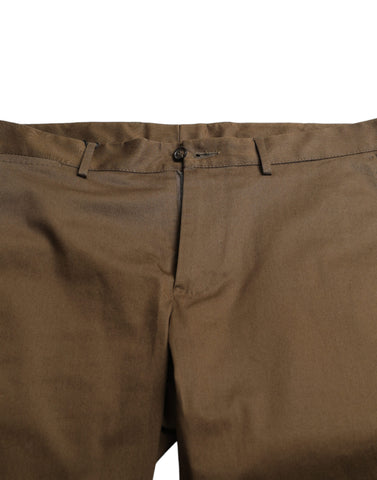 Brown cotton stretch men's Bermuda shorts by Dolce & Gabbana laid flat showing front view with belt loops and stitching details.