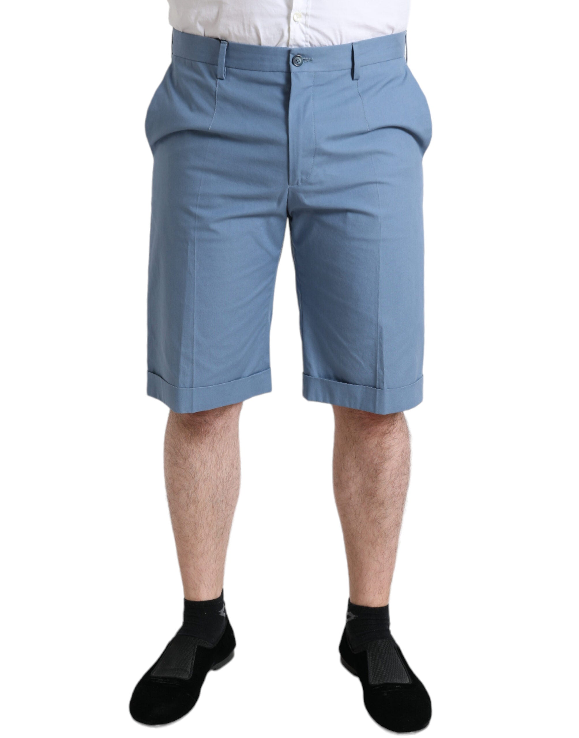 Sky blue cotton men's Bermuda shorts with folded hem by Dolce & Gabbana, displayed folded on a neutral background.