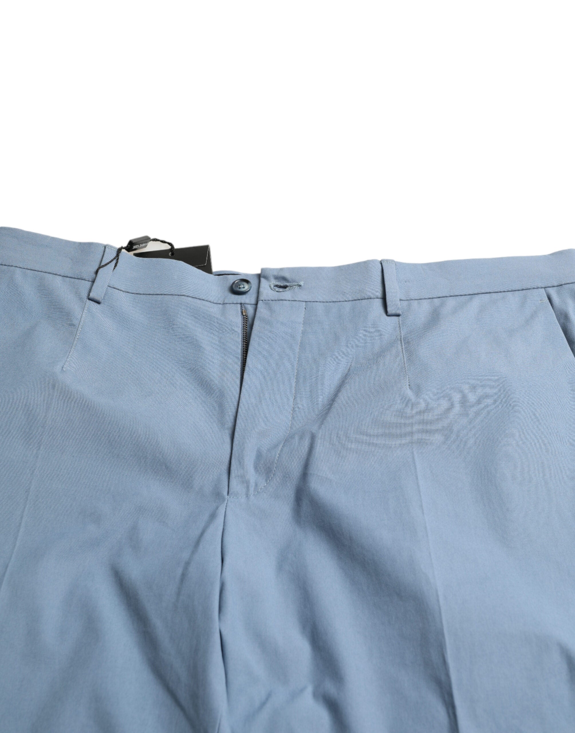 Sky blue cotton Bermuda shorts for men with folded hem by Dolce & Gabbana, neatly folded and displayed on a white background.