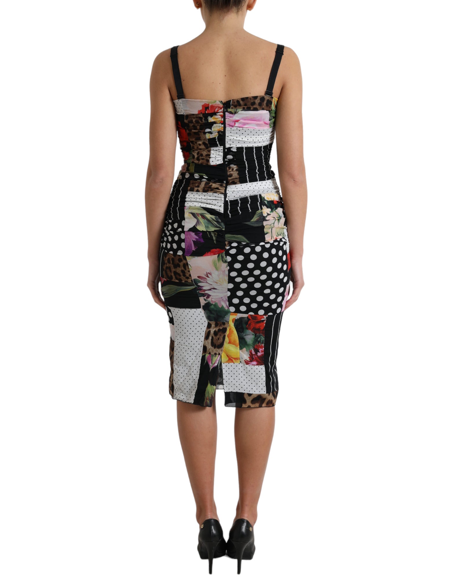 Multicolor patchwork floral and leopard print Dolce & Gabbana midi bodycon dress, fitted silhouette with vibrant patchwork pattern.