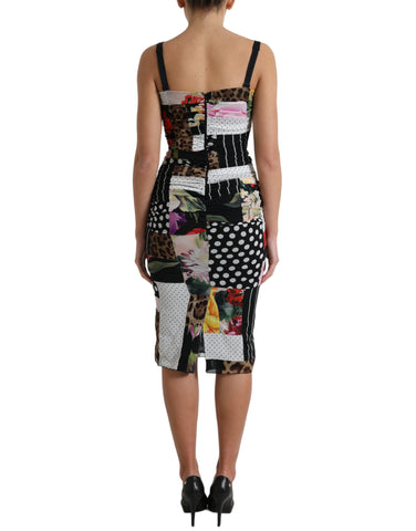Multicolor patchwork floral and leopard print Dolce & Gabbana midi bodycon dress, fitted silhouette with vibrant patchwork pattern.