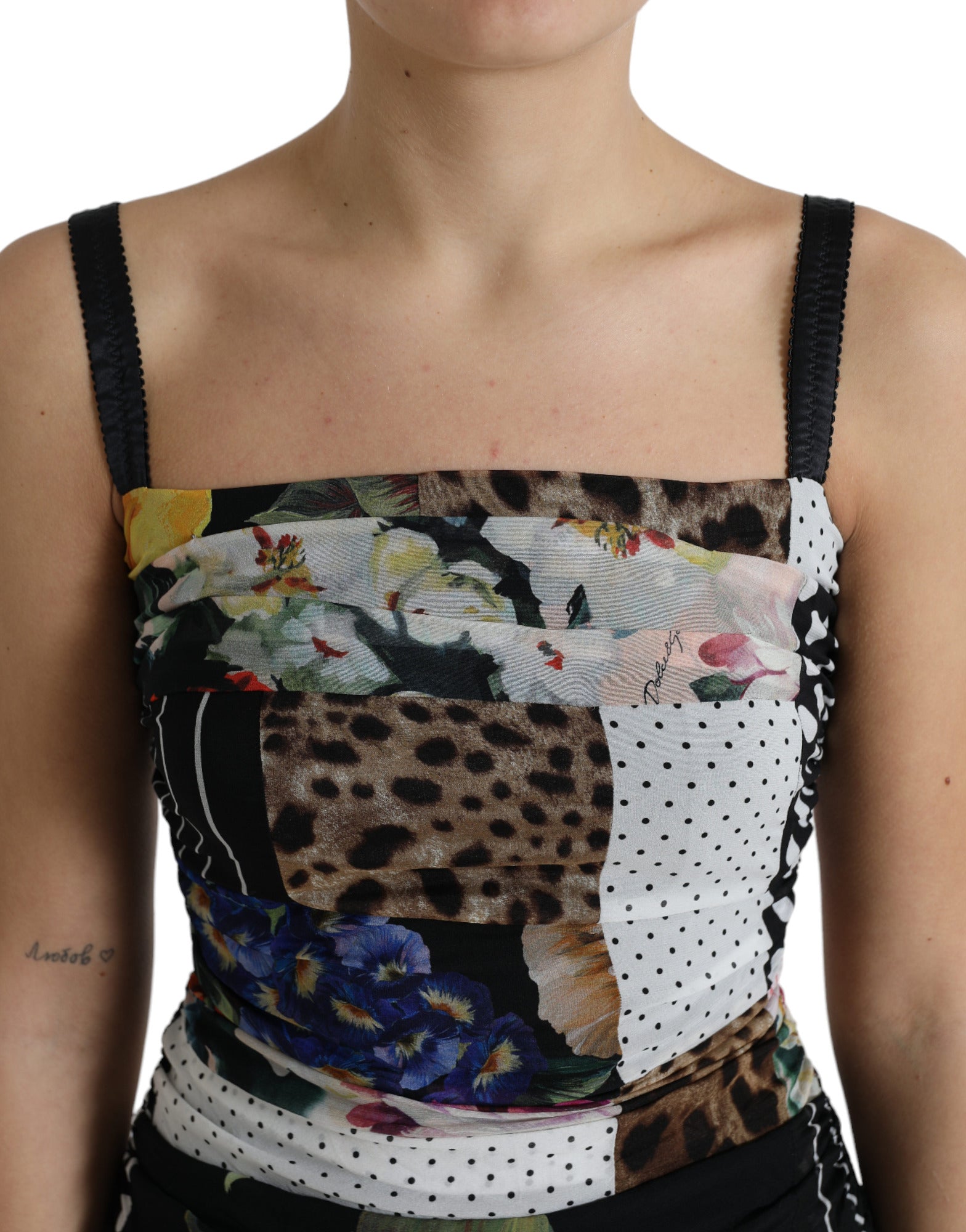 Multicolor patchwork floral and leopard print midi bodycon dress by Dolce & Gabbana, featuring vibrant patchwork design and fitted silhouette.