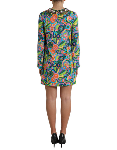 Multicolor geometric print silk midi dress by Dolce & Gabbana featuring crystal embellishments and a flowing silhouette.