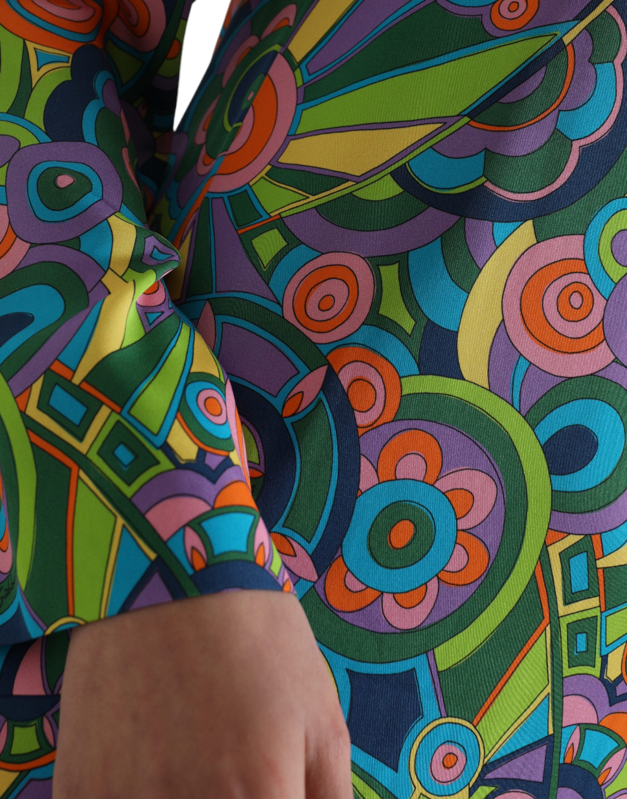Multicolor geometric print silk midi dress by Dolce & Gabbana featuring crystal embellishments and a flowing silhouette.