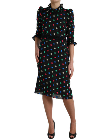 Black polka dot ruffle cotton midi dress by Dolce & Gabbana, featuring a flowy silhouette with ruffled details and a mid-length design.
