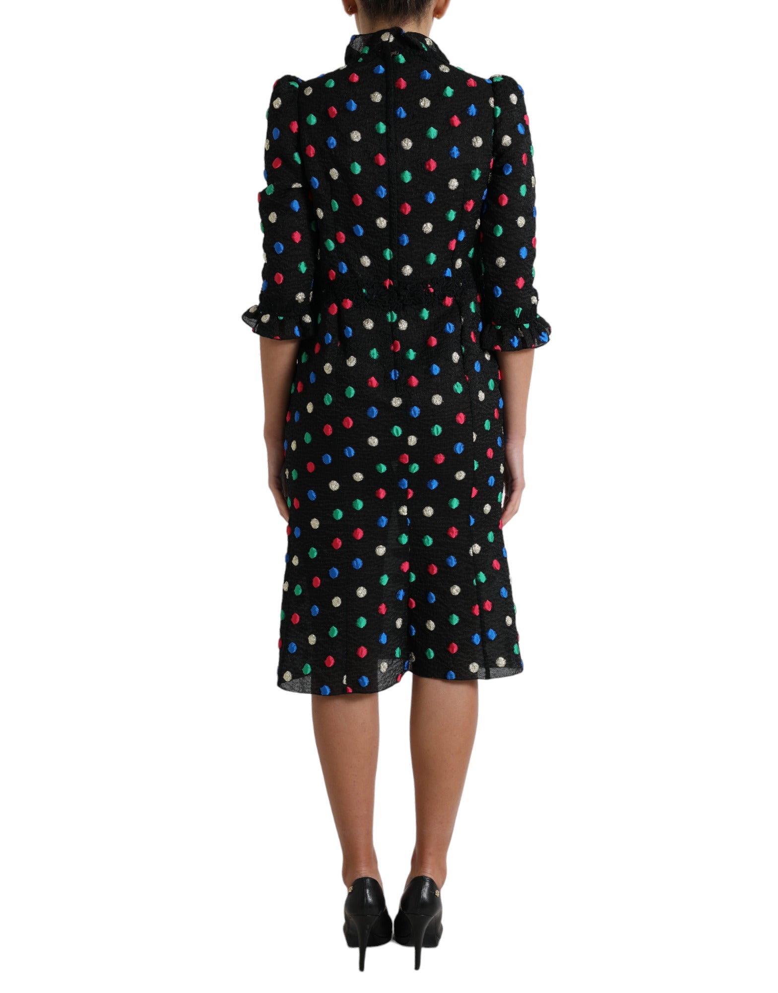Black polka dot ruffle cotton midi dress by Dolce & Gabbana, featuring a feminine ruffled neckline and classic polka dot pattern.