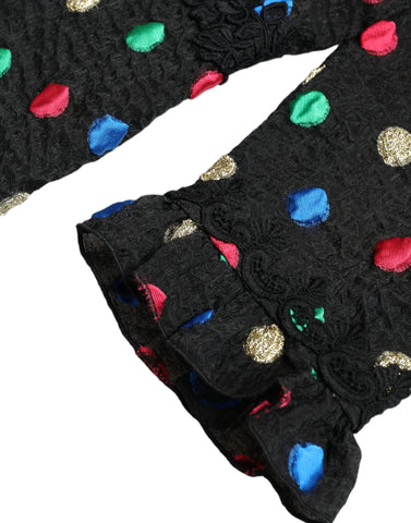 Black polka dot ruffle cotton midi dress by Dolce & Gabbana, featuring a flowy silhouette and playful ruffle details.