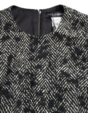 Black Chevron polyester shift mini dress by Dolce & Gabbana, featuring a stylish V-neck and sleeveless design.