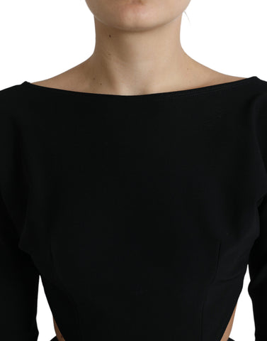 Black viscose Dolce & Gabbana A-line mini dress with cut-out details and long sleeves, stylish and elegant for fashionable occasions.