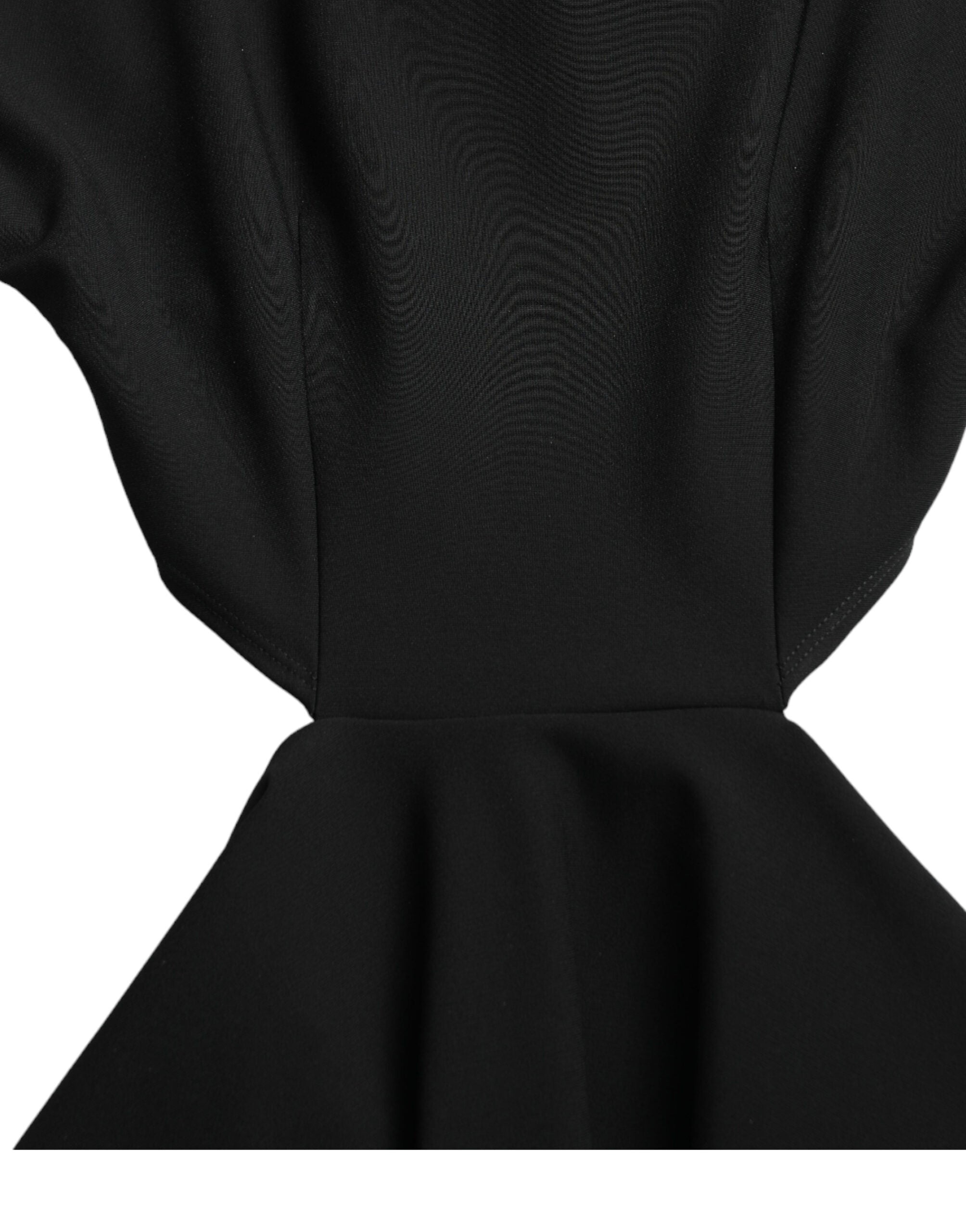 Black viscose cut-out A-line mini dress with long sleeves by Dolce & Gabbana, shown on a model.