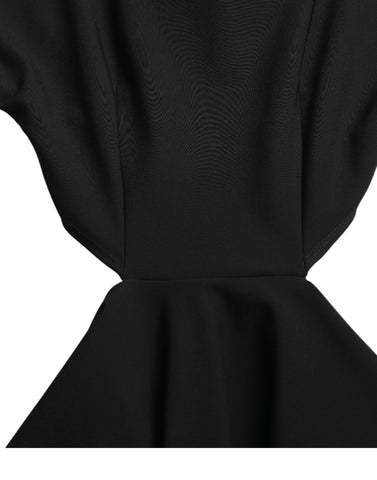 Black viscose cut-out A-line mini dress with long sleeves by Dolce & Gabbana, shown on a model.