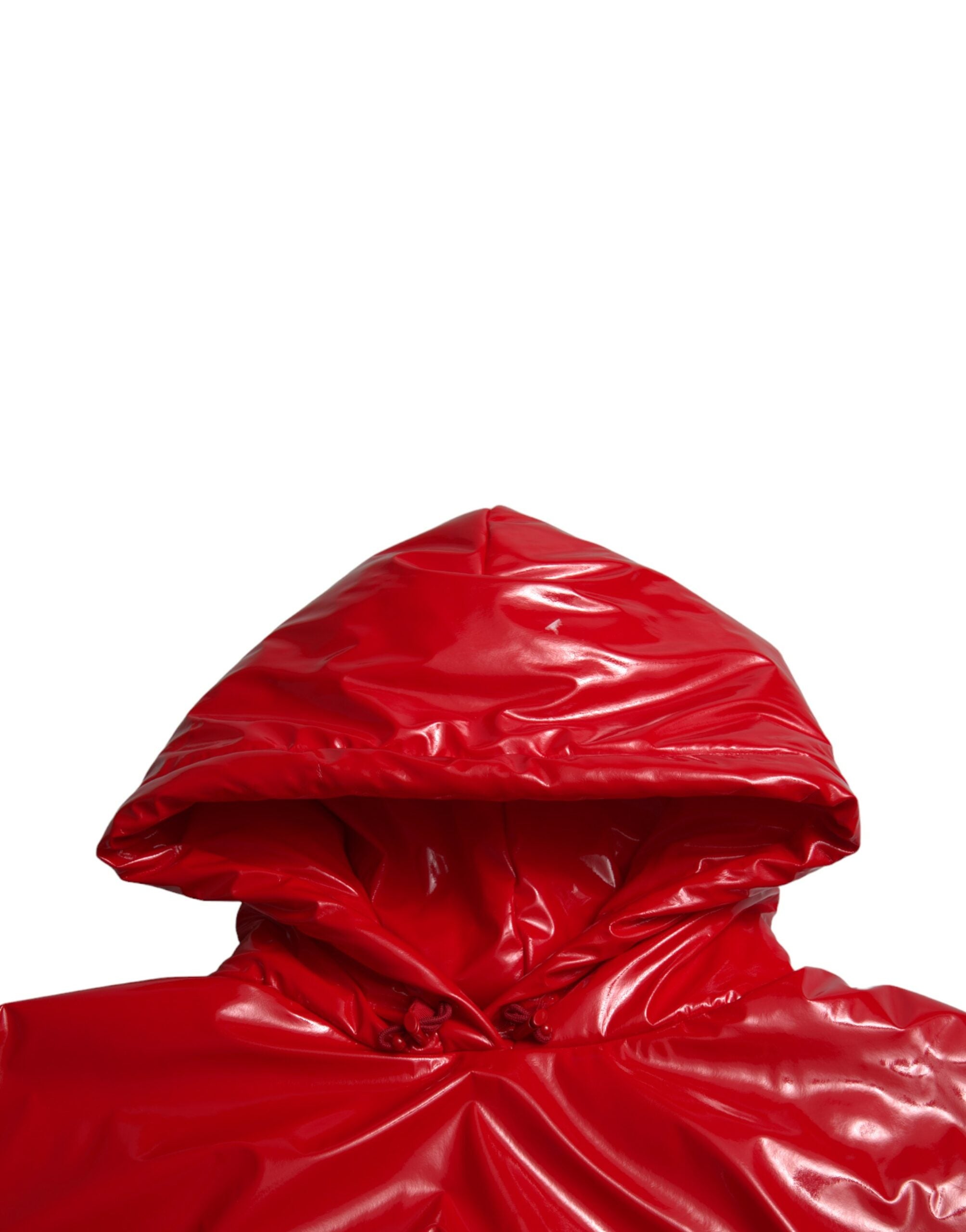 Shiny red hooded cropped short coat jacket by Dolce & Gabbana, shown with a front view highlighting the glossy fabric and hood detail.