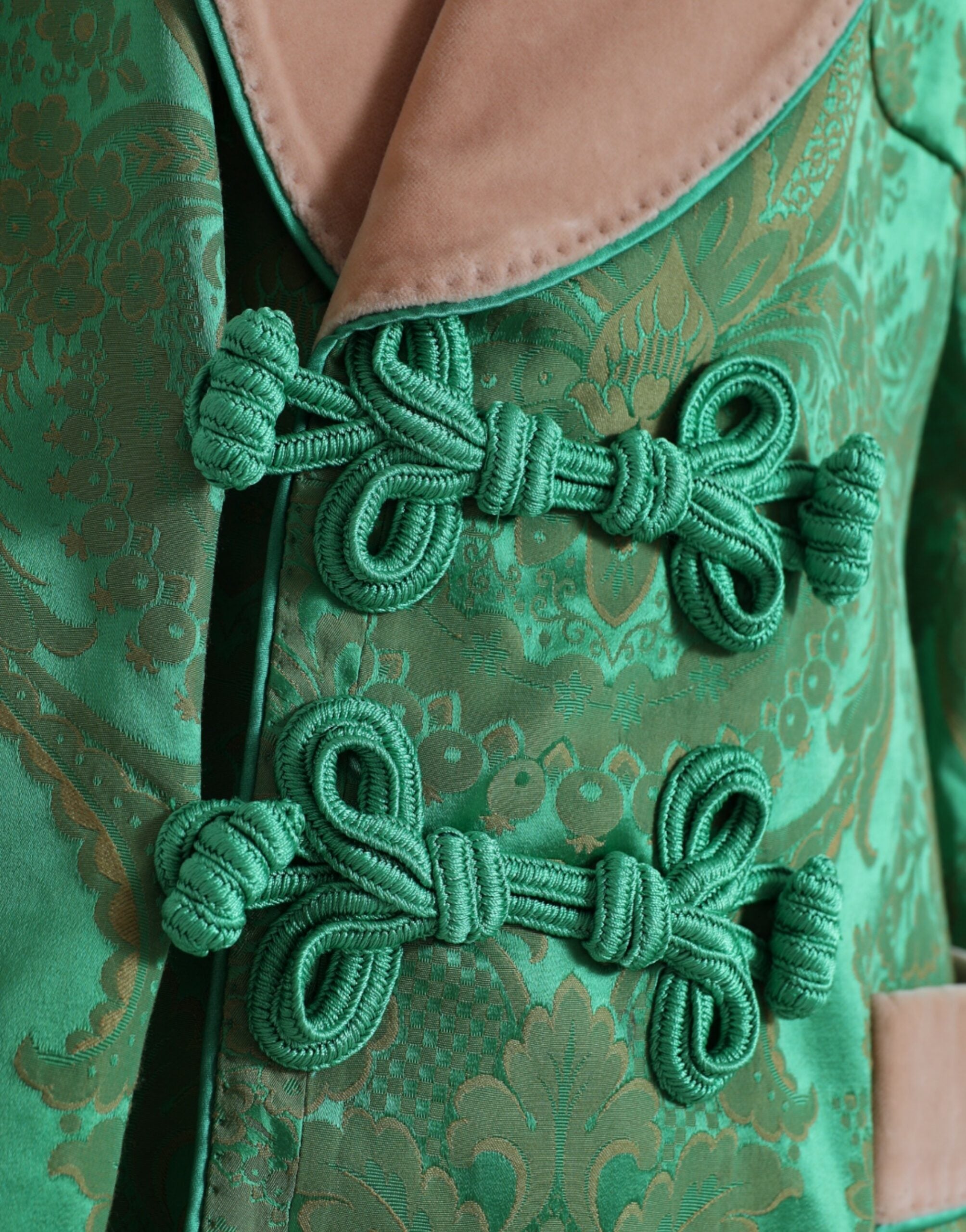 Green floral double-breasted coat jacket by Dolce & Gabbana, featuring a vibrant floral pattern and classic tailored design.