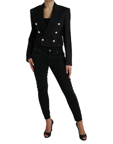 Black striped Sicilia double-breasted jacket by Dolce & Gabbana, tailored with lapels and button details, displayed on a hanger.