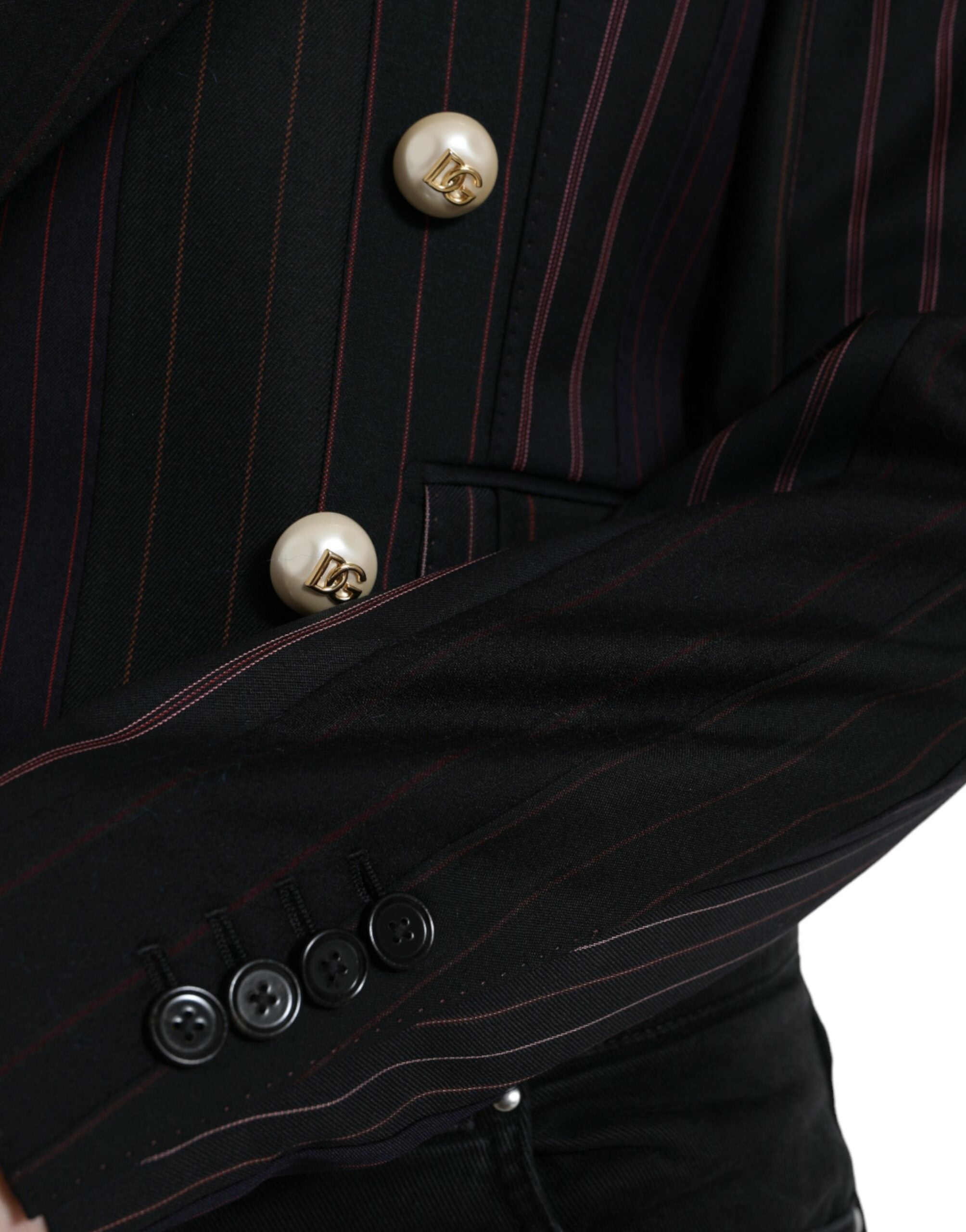 Black striped Sicilia double-breasted jacket by Dolce & Gabbana, tailored with classic lapels and button closure.