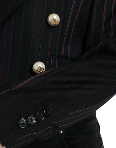 Black striped Sicilia double-breasted jacket by Dolce & Gabbana, tailored with classic lapels and button closure.