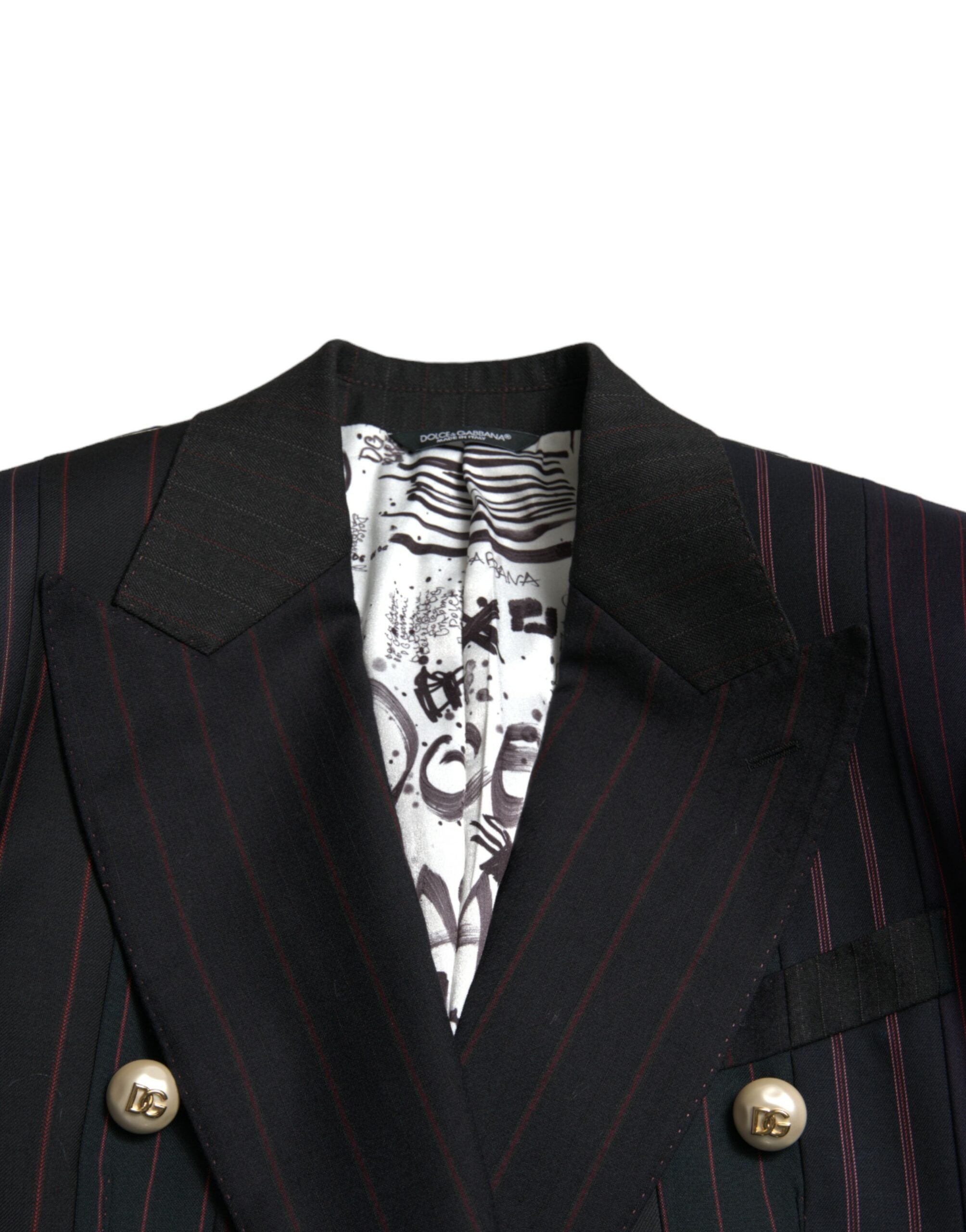 Black striped Sicilia double-breasted jacket by Dolce & Gabbana with tailored fit and classic lapels, displayed on a hanger.