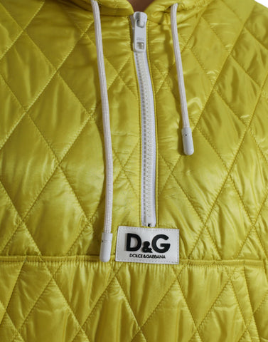 Yellow nylon quilted hooded pullover jacket by Dolce & Gabbana with a padded design and drawstring hood.