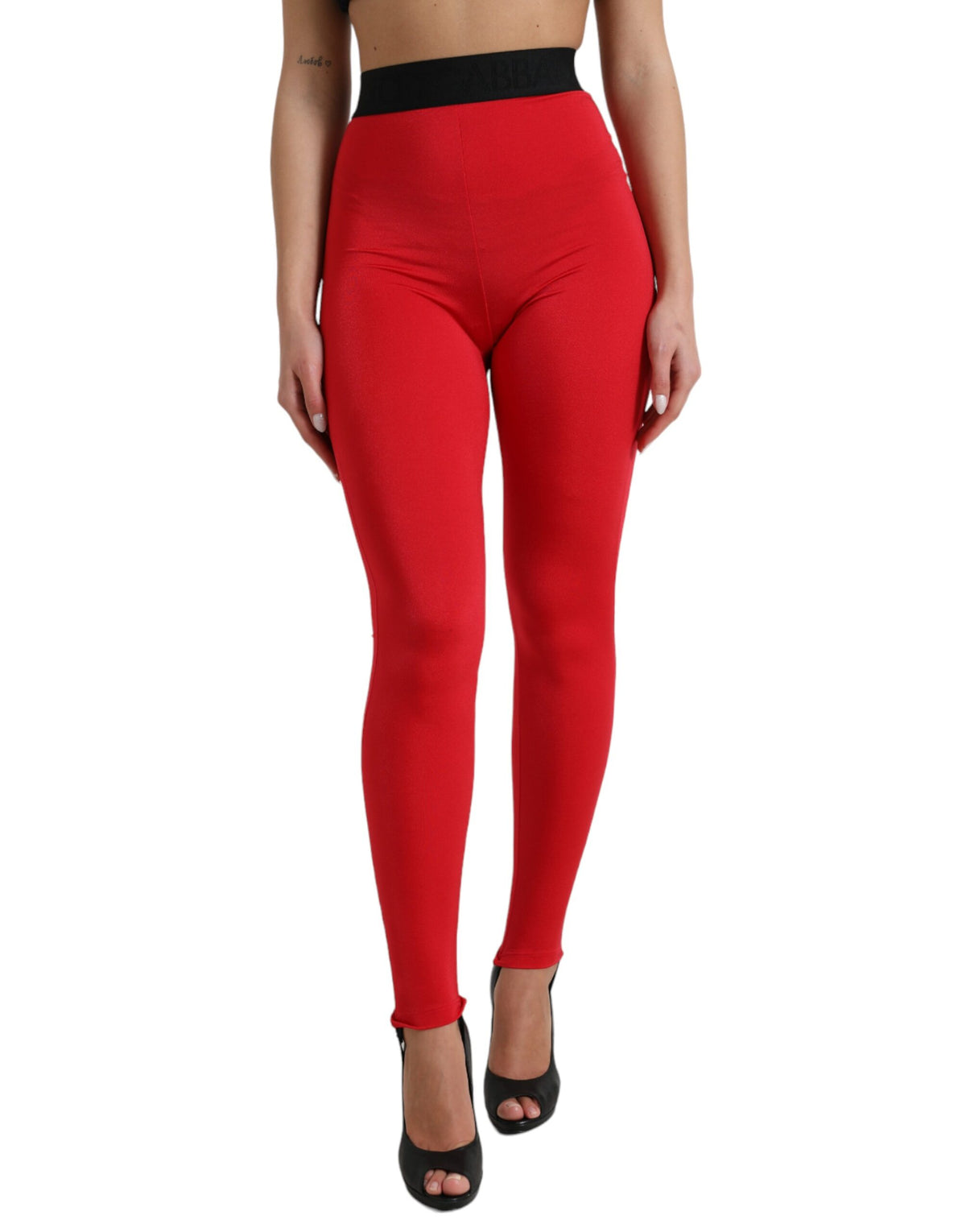 Red nylon Dolce & Gabbana logo slim leggings with a fitted design and elastic waistband, stylish and comfortable for casual wear.