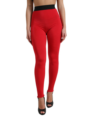 Red nylon Dolce & Gabbana logo slim leggings with a fitted design and elastic waistband, stylish and comfortable for casual wear.
