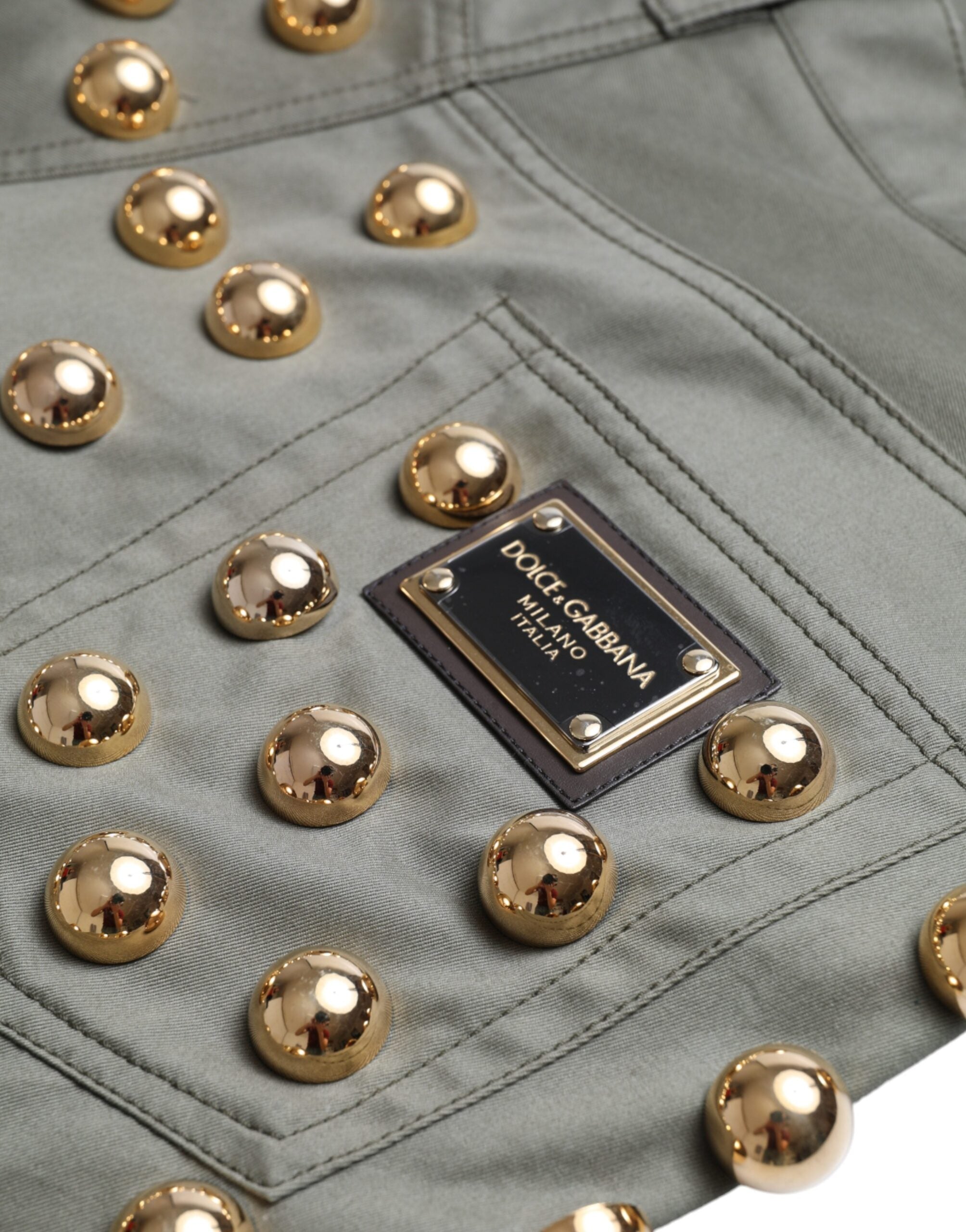 Green embellished cotton high-waist hot pants shorts by Dolce & Gabbana with decorative details and a fitted high-rise design.