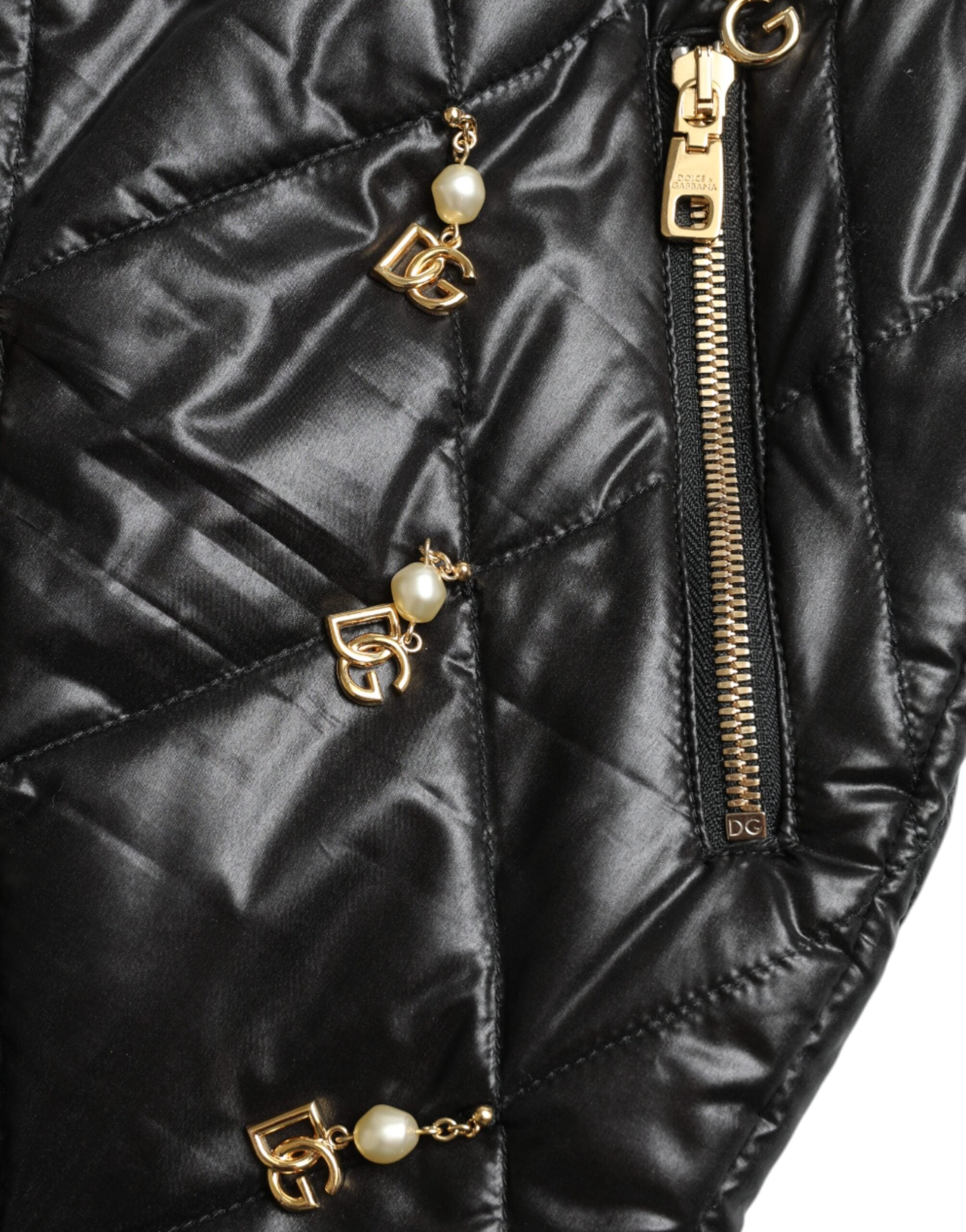 Black embellished high waist hot pants shorts by Dolce & Gabbana with decorative details and a fitted style.