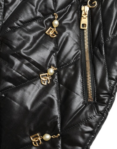 Black embellished high waist hot pants shorts by Dolce & Gabbana with decorative details and a fitted style.