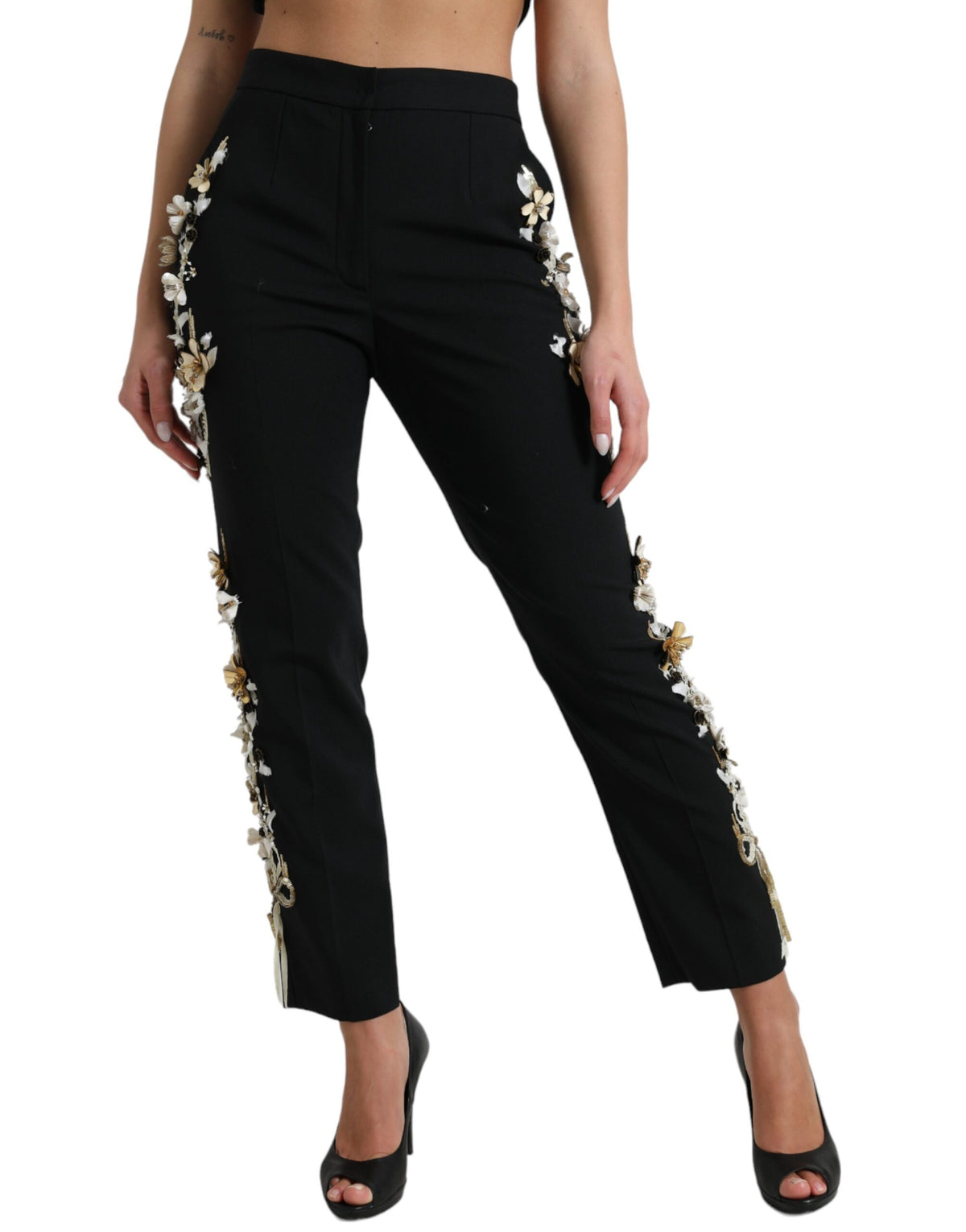 Black floral applique high waist tapered pants by Dolce & Gabbana, featuring elegant floral details and a tailored fit.