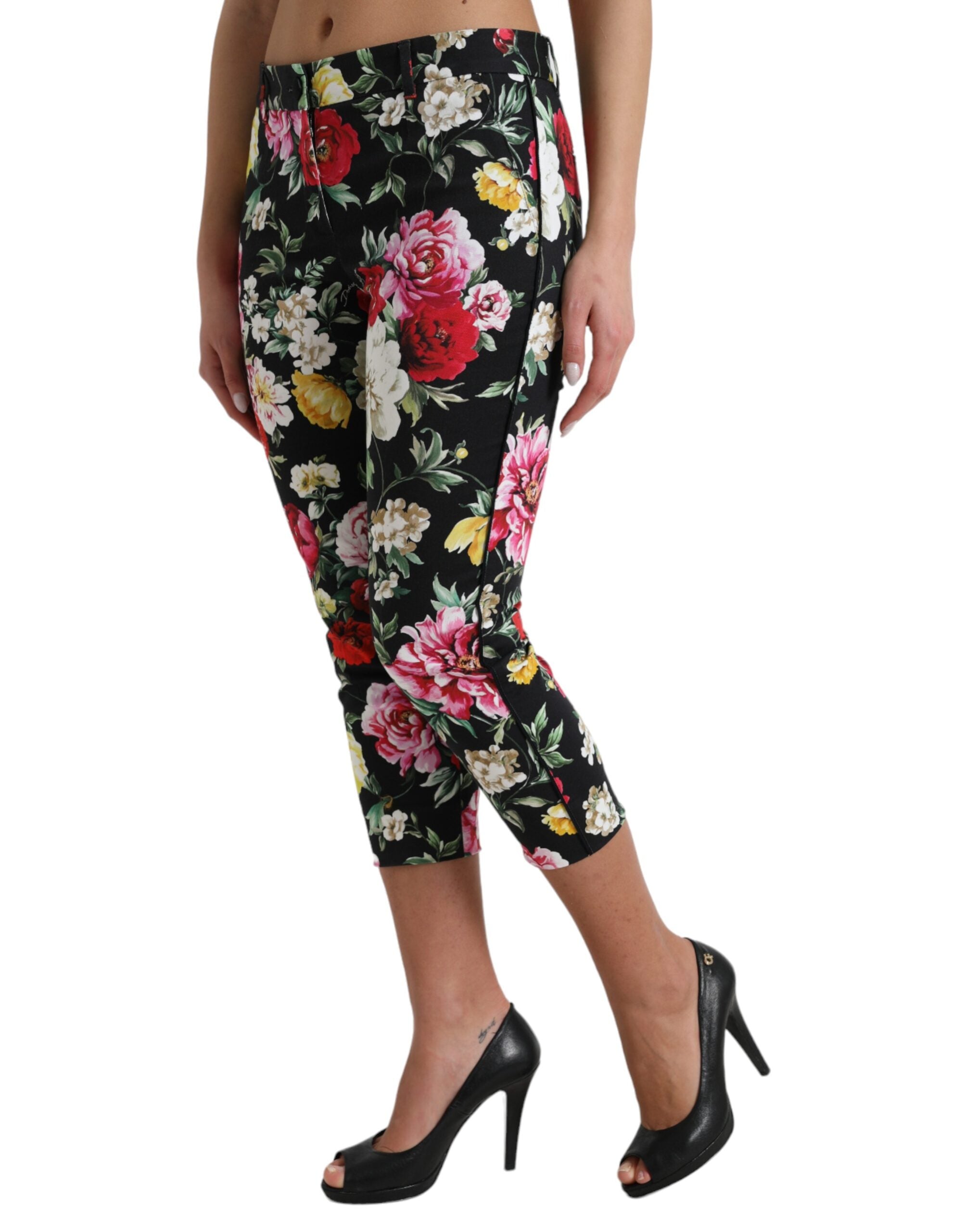 Black floral print mid waist cropped pants by Dolce & Gabbana, featuring a stylish floral design and tailored fit.