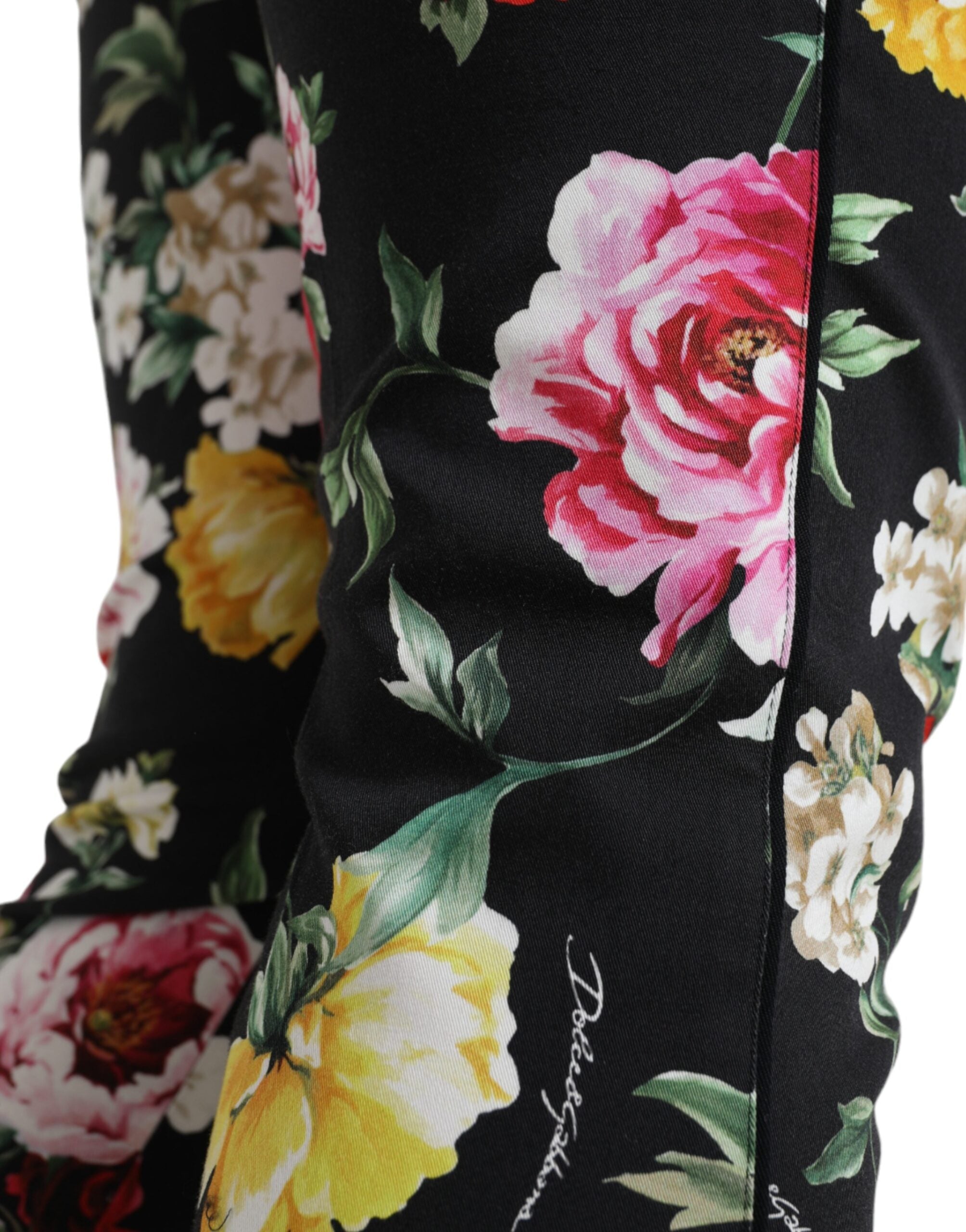 Black floral print mid-waist cropped pants by Dolce & Gabbana, featuring a stylish floral pattern and tailored fit.