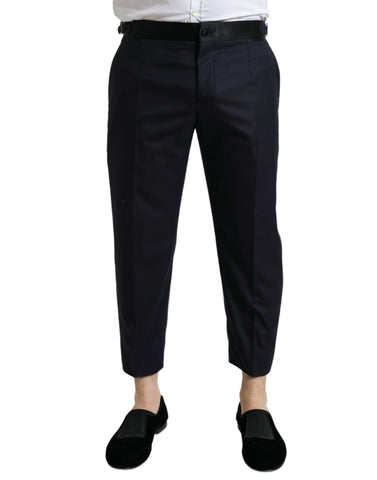 Blue wool cropped tapered pants by Dolce & Gabbana, featuring a tailored fit and stylish design.