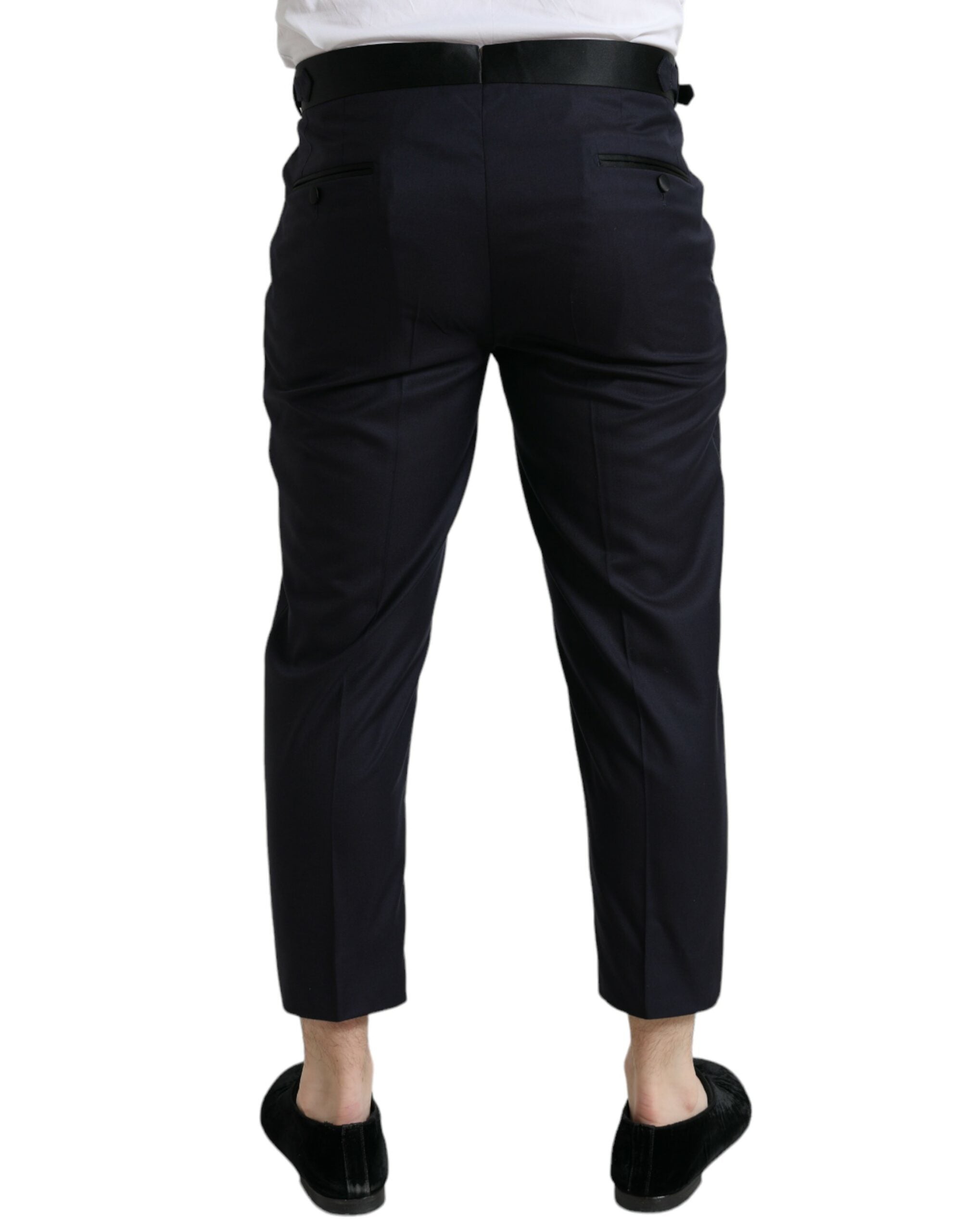 Blue wool cropped tapered pants by Dolce & Gabbana, featuring a tailored fit and stylish design.