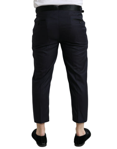 Blue wool cropped tapered pants by Dolce & Gabbana, featuring a tailored fit and stylish design.