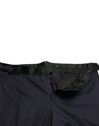 Blue wool cropped tapered pants by Dolce & Gabbana, featuring a tailored fit and stylish design.