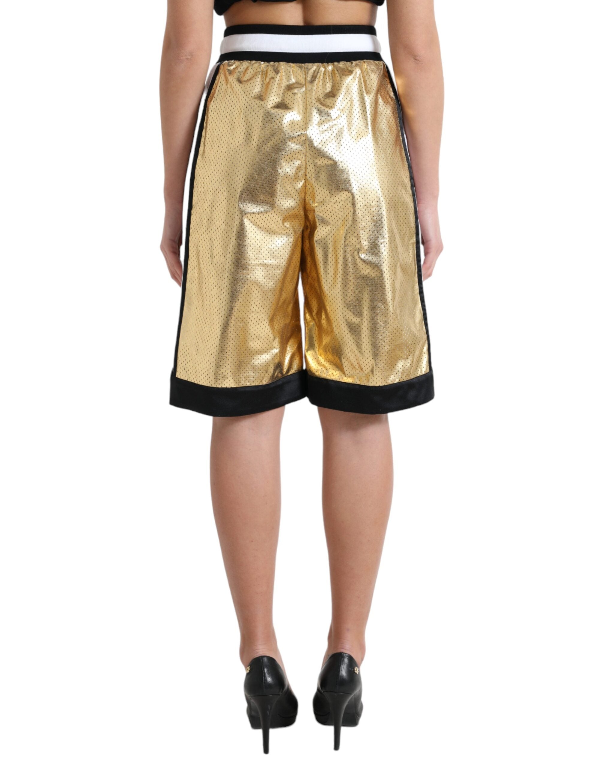 Gold polyester perforated high waist shorts by Dolce & Gabbana, with a stylish perforated design and high-rise fit.