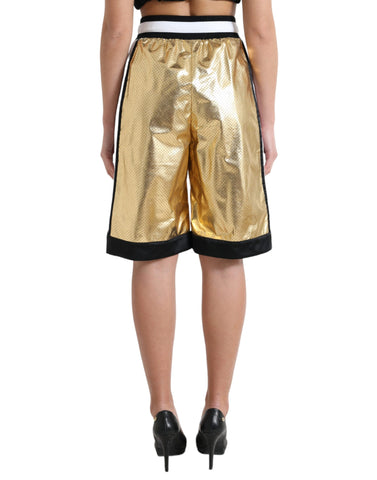 Gold polyester perforated high waist shorts by Dolce & Gabbana, with a stylish perforated design and high-rise fit.