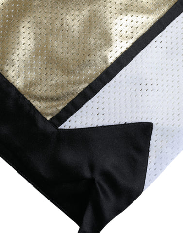 Gold polyester perforated high waist shorts by Dolce & Gabbana, featuring a stylish perforated design and high-rise fit.