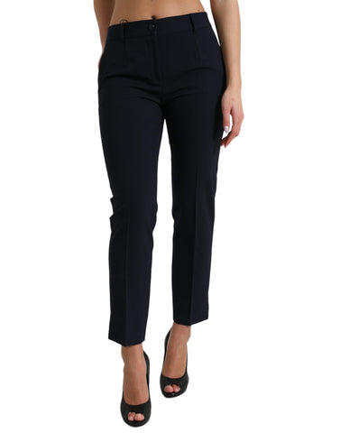 Blue mid waist tapered cropped pants by Dolce & Gabbana, showcasing the tailored fit and stylish design.